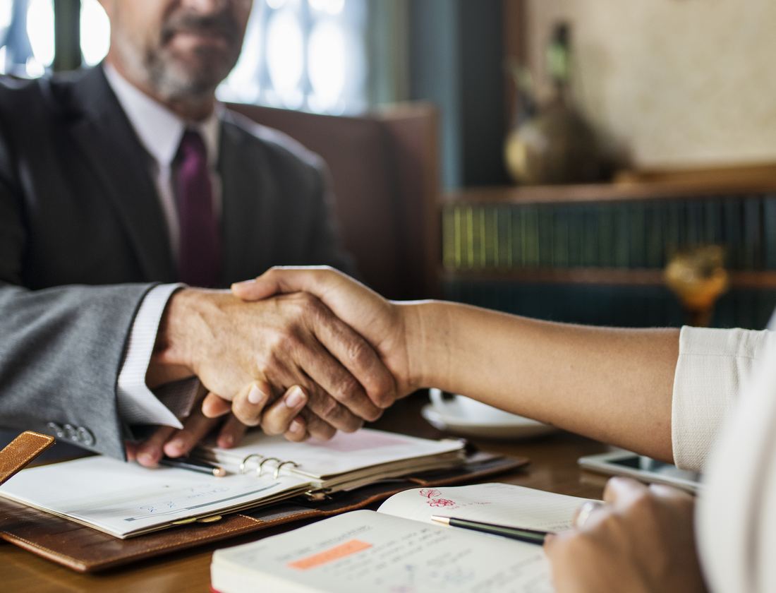 Attorney meeting with a client